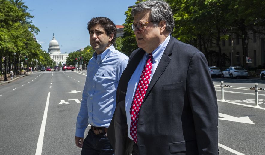 Attorney General William Barr crosses Pennsylvania Avenue NW from the Department of Justice building, Saturday, May 30, 2020, in Washington. Mr. Barr said there is evidence of antifa coordinating violent riots and looting that have rocked major American cities the past few nights. (AP Photo/Manuel Balce Ceneta)