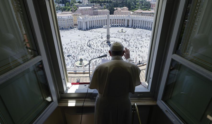Pope Francis delivers his blessing from his studio window overlooking St. Peter&#x27;s Square at the Vatican, Sunday, May 31, 2020. Francis celebrated a Pentecost Mass in St. Peter&#x27;s Basilica on Sunday, albeit without members of the public in attendance. He will then went to his studio window to recite his blessing at noon to the crowds below. The Vatican says police will ensure the faithful gathered in the piazza keep an appropriate distance apart. (Vatican News via AP)