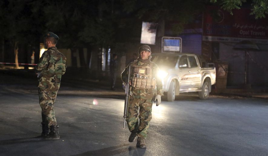 Afghan security forces arrive at the site of a bombing in a mosque in Kabul, Afghanistan, Tuesday, June 2, 2020. Tariq Arian, spokesman for the Afghan interior ministry says the the attack has taken place inside the compound of Wazir Akber Khan Mosque on the Tuesday evening. (AP Photo/Rahmat Gul)