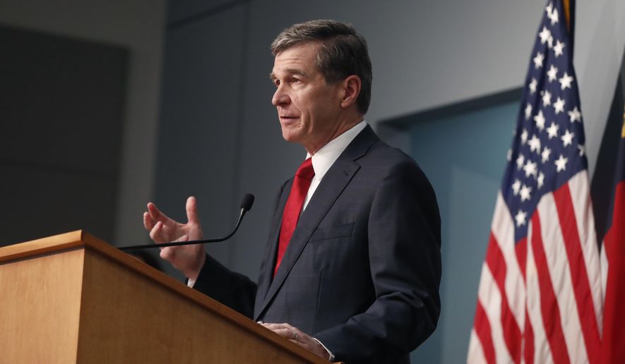 North Carolina Gov. Roy Cooper speaks during a briefing at the Emergency Operations Center in Raleigh, N.C., Tuesday, June 2, 2020. (Ethan Hyman/The News &amp;amp; Observer via AP)