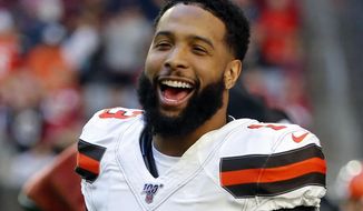 FILE - In this Dec. 15, 2019, file photo, Cleveland Browns wide receiver Odell Beckham (13) laughs during an NFL football game against the Arizona Cardinals in Glendale, Ariz. Beckham, who skipped Cleveland&#x27;s program last spring after being acquired from the Giants, has been a “model guy” during the team&#x27;s virtual program. (AP Photo/Rick Scuteri, File)