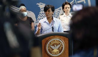 Atlanta Mayor Keisha Lance Bottoms announces a 9 PM curfew as protests continue for a second day over the death of George Floyd, Saturday, May 30, 2020 in Atlanta. Protests were held throughout the country over the death of Floyd, a black man who died after being restrained by Minneapolis police officers on May 25. (Ben Gray/Atlanta Journal-Constitution via AP)