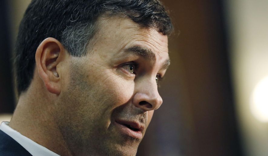 Secretary of State Michael Watson speaks to members of the Senate and House Elections Committees during a joint hearing at the Mississippi State Capitol in Jackson, Miss., Wednesday, June 3, 2020. (AP Photo/Rogelio V. Solis)