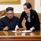 In this Sept. 19, 2018, file photo, Kim Yo-jong, right, helps her brother North Korean leader Kim Jong-un sign a joint statement following the summit with South Korean President Moon Jae-in at the Paekhwawon State Guesthouse in Pyongyang, North Korea. (Pyongyang Press Corps Pool via AP, File)