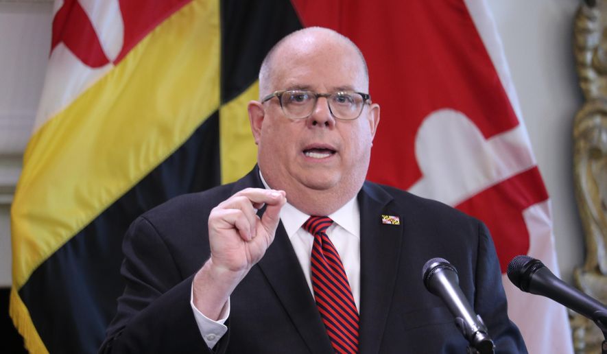 Maryland Gov. Larry Hogan announces he will lift an order that closed non-essential businesses this week during a news conference on Wednesday, June 3, 2020 in Annapolis, Md. The order will be lifted Friday at 5 p.m. (AP Photo/Brian Witte)