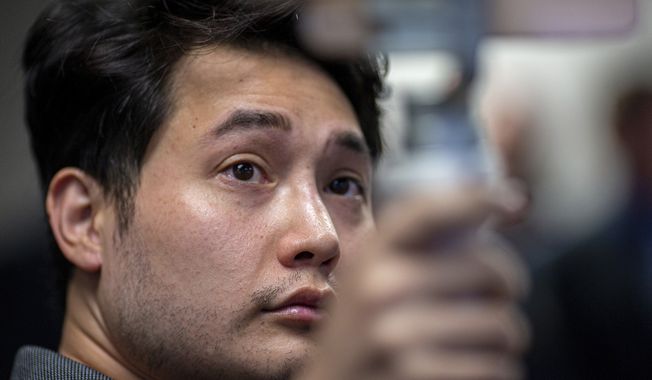 In this Sept. 12, 2019, file photo, Andy Ngo, a conservative journalist, attends a press conference in Portland, Ore. Ngo has filed a lawsuit against purported elements of the nebulous far-left-leaning militant groups collectively known as Antifa on Thursday, June 4, 2020. (Mark Graves/The Oregonian via AP)