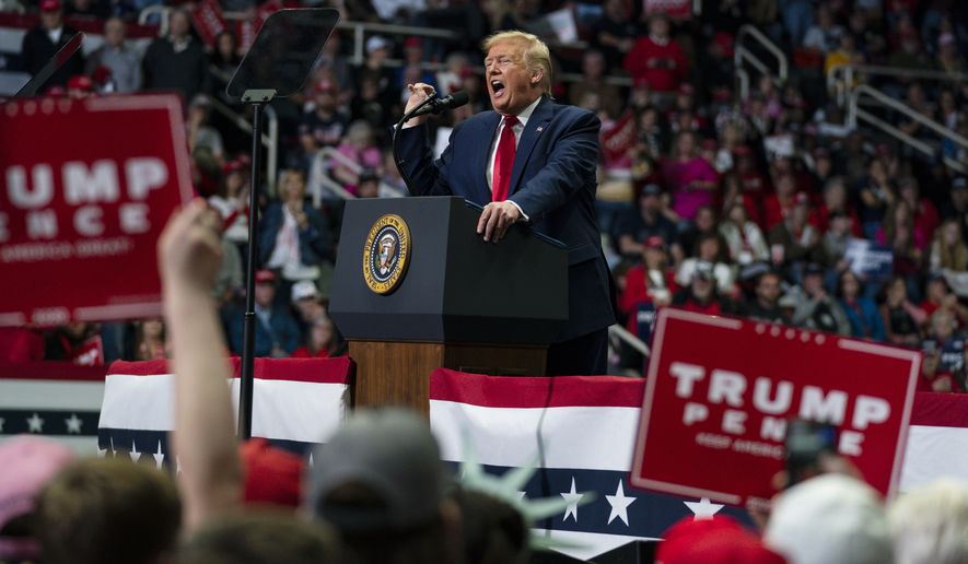 In this March 2, 2020, file photo, President Donald Trump speaks during a campaign rally at Bojangles Coliseum in Charlotte, N.C. Google said state-based hackers have targeted the campaigns of both Trump and former Vice President Joe Biden, although it saw no evidence that the phishing attempts were successful. The company confirmed the findings after the director of its Threat Analysis Group, Shane Huntley, disclosed the attempts Thursday, June 4, 2020, on Twitter. (AP Photo/Evan Vucci, File)