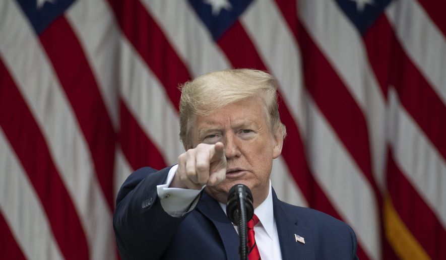 In this May 11, 2020, file photo, President Donald Trump points to a question as he speaks about the coronavirus during a press briefing in the Rose Garden of the White House in Washington. (AP Photo/Alex Brandon) ** FILE **
