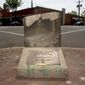 This May 5, 2005, file photo, shows the historic pre-civil war auction block for slaves and property at the corner of Charles and William Streets in downtown Fredericksburg, Va. The 800-pound stone was pulled from the ground at a Fredericksburg street corner early Friday, June 5, 2020, after its removal was delayed for months by lawsuits and the coronavirus pandemic, The Free Lance-Star reported. (Reza A Marvashti/The Free Lance-Star via AP, File)