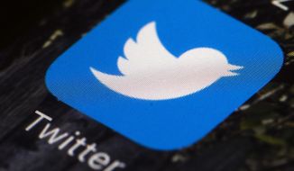 This April 26, 2017, file photo shows the Twitter app icon on a mobile phone in Philadelphia. (AP Photo/Matt Rourke, File)