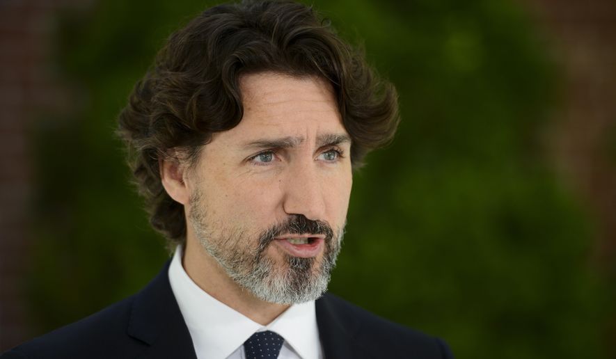 In this file photo, Prime Minister Justin Trudeau holds a press conference at Rideau Cottage during the COVID-19 pandemic in Ottawa on Friday, June 5, 2020. Mr. Trudeau was apparently the target of an armed man who crashed through a gate near the prime minister&#39;s residence on July 2, 2020.  (Sean Kilpatrick/The Canadian Press via AP)