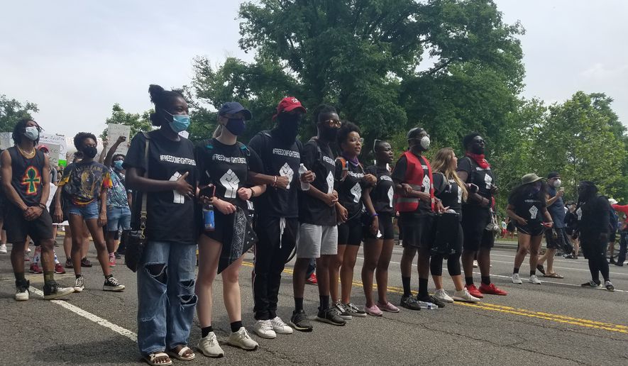 Black Lives Matter protesters are seen on Constitution Avenue NW in Washington, D.C., during a march from the Dirksen Senate Office Building to the White House on Saturday, June 6, 2020. (Photo by Adam Zielonka/The Washington Times)