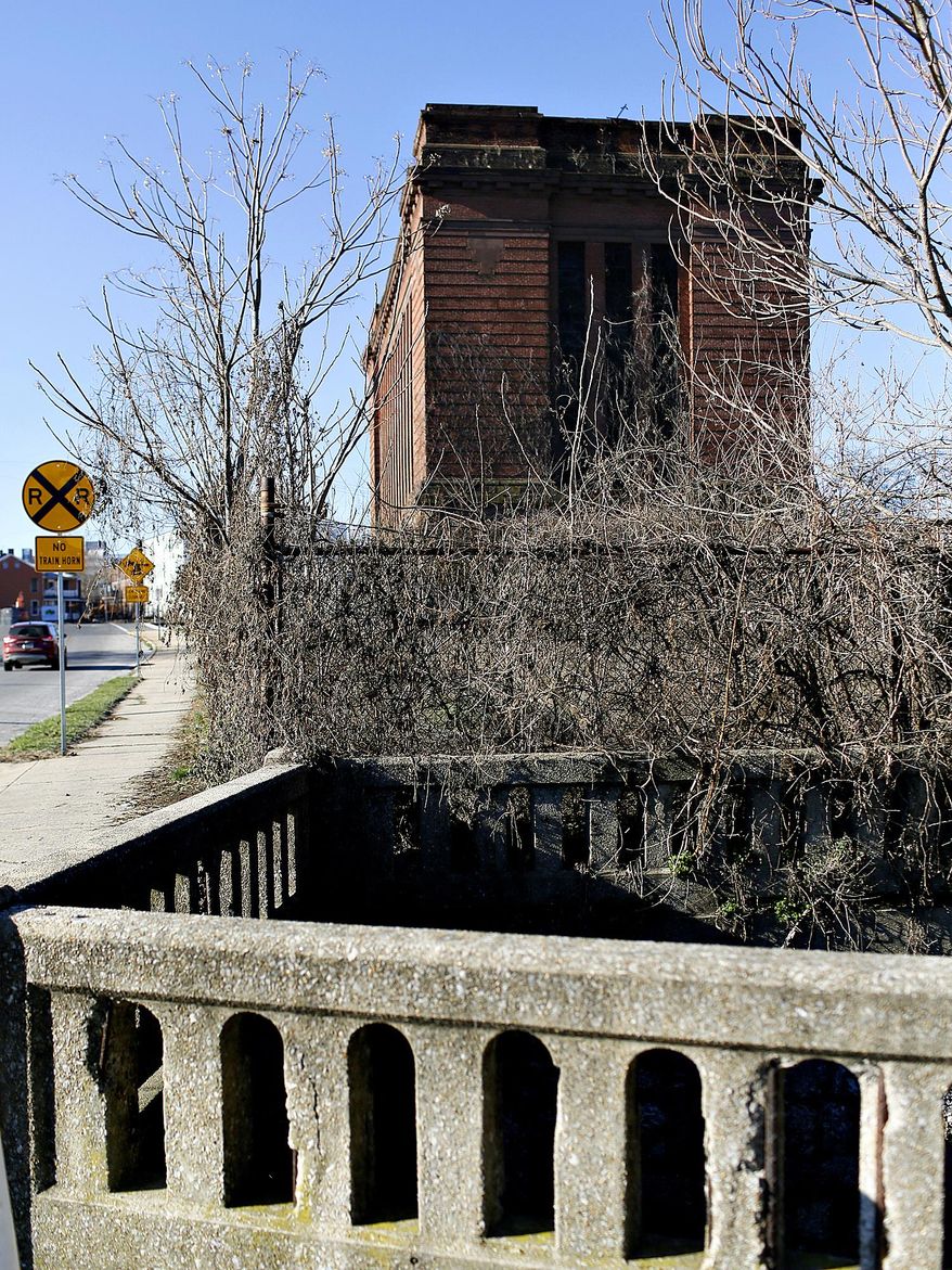 This Jan. 6, 2016, photo shows the former York County Prison, back. The beaten body of George Costella Sr. was found May 31, 1990, in Poor House Run, located next to the old York County Prison on Chestnut Street. The homicide remains unsolved, but his siblings still hope an arrest will be made. Thirty years ago, Costella's loved ones lost the family man and gifted artist to an act of violence in York City that police have been unable to solve. (Dawn J. Sagert/York Dispatch via AP)