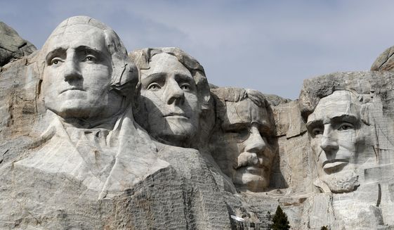 This March 22, 2019, file photo shows Mount Rushmore in Keystone, S.D. Organizers have scrapped plans to mandate social distancing during President Donald Trump's appearance at a July 3, 2020, Mount Rushmore fireworks display and won't limit the crowd due to coronavirus concerns, South Dakota Gov. Kristi Noem said Thursday, June 4, 2020. The Republican governor said the National Park Service is dolling out 7,500 tickets via lottery for the event, which marks the first time in a decade that fireworks will be set off at the memorial in recognition of Independence Day. (AP Photo/David Zalubowski, File)