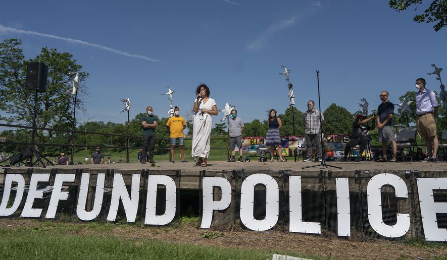 Alondra Cano, a City Council member, speaks during &quot;The Path Forward&quot; meeting at Powderhorn Park on Sunday, June 7, 2020, in Minneapolis. The focus of the meeting was the defunding of the Minneapolis Police Department. (Jerry Holt/Star Tribune via AP)