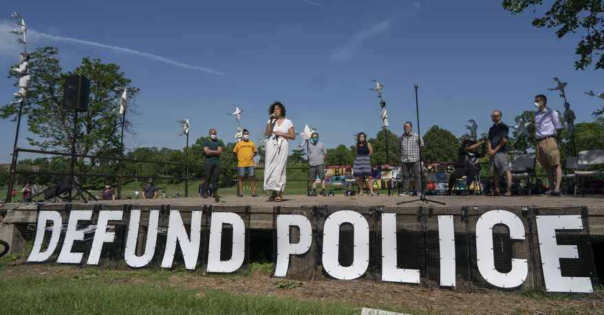 Alondra Cano, a City Council member, speaks during &quot;The Path Forward&quot; meeting at Powderhorn Park on Sunday, June 7, 2020, in Minneapolis. The focus of the meeting was the defunding of the Minneapolis Police Department. (Jerry Holt/Star Tribune via AP)