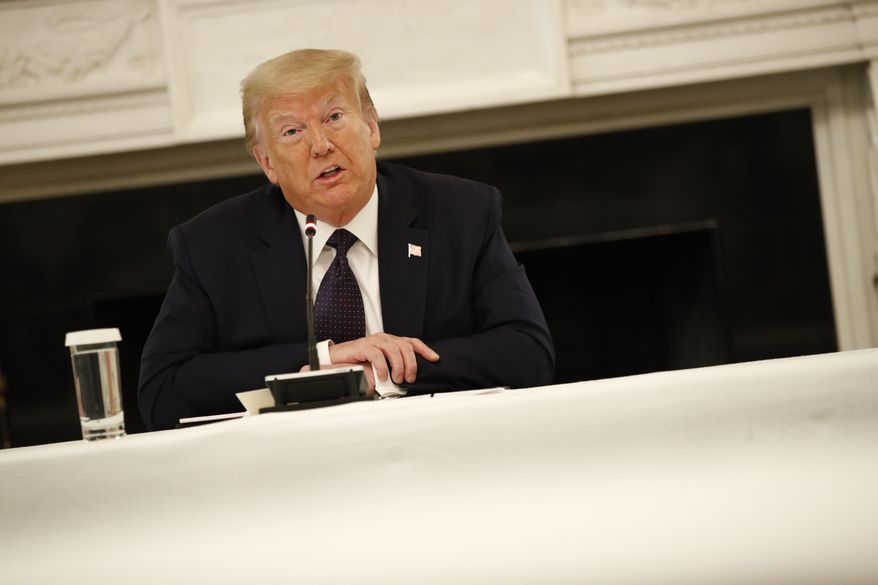 President Donald Trump speaks during a roundtable discussion with law enforcement officials, Monday, June 8, 2020, in the State Dining Room of the White House in Washington. (AP Photo/Patrick Semansky)