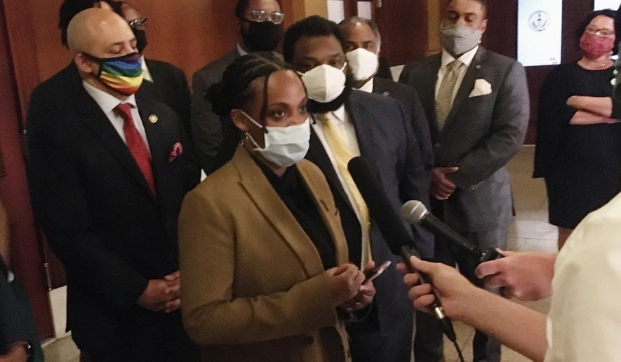 Pennsylvania state Rep. Summer Lee, a Democrat from Pittsburgh, speaks with reporters in the Pennsylvania Capitol in Harrisburg, Pa., Monday, June 8, 2020. Lee and other Democrats commandeered the state House rostrum on Monday to press for movement on bills to change police procedures and accountability. (AP Photo/Mark Scolforo)