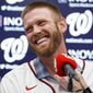 FILE - In this Dec. 17, 2019, file photo, Washington Nationals pitcher Stephen Strasburg smiles during a media availability at Nationals Park in Washington. Baseball’s amateur draft this week will look much different because of the coronavirus pandemic, and more permanent changes could be coming soon. (AP Photo/Alex Brandon, File)