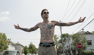 In this image released by Universal Pictures, Pete Davidson appears in a scene from &amp;quot;The King of Staten Island,&amp;quot; directed by Judd Apatow. (Mary Cybulski/Universal Pictures via AP)