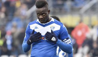 FILE - In this Sunday, Feb. 9, 2020 filer, Brescia&#x27;s Mario Balotelli reacts during the Italian Serie A soccer match between Brescia and Udinese at the Mario Rigamonti stadium in Brescia, Italy. The former Italy striker was reportedly fired by his hometown club for failing to report for training as the Italian soccer season prepares to resume from a three-month break due to the coronavirus pandemic. (Gianluca Checchi/LaPresse via AP, File )