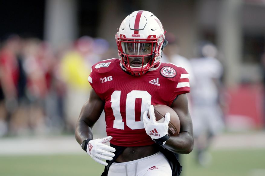 FILE - In this Sept. 14, 2019, file photo, Nebraska wide receiver JD Spielman (10) warms up before playing an NCAA college football game against Northern Illinois in Lincoln, Neb. Spielman, one of the top receivers in Nebraska history, has entered his name in the transfer portal, the school confirmed Monday, June 8, 2020. Spielman is the first player to put together three straight 800-yard receiving seasons for the Cornhuskers and leaves No. 3 in career receptions and yards. (AP Photo/Nati Harnik, File)
