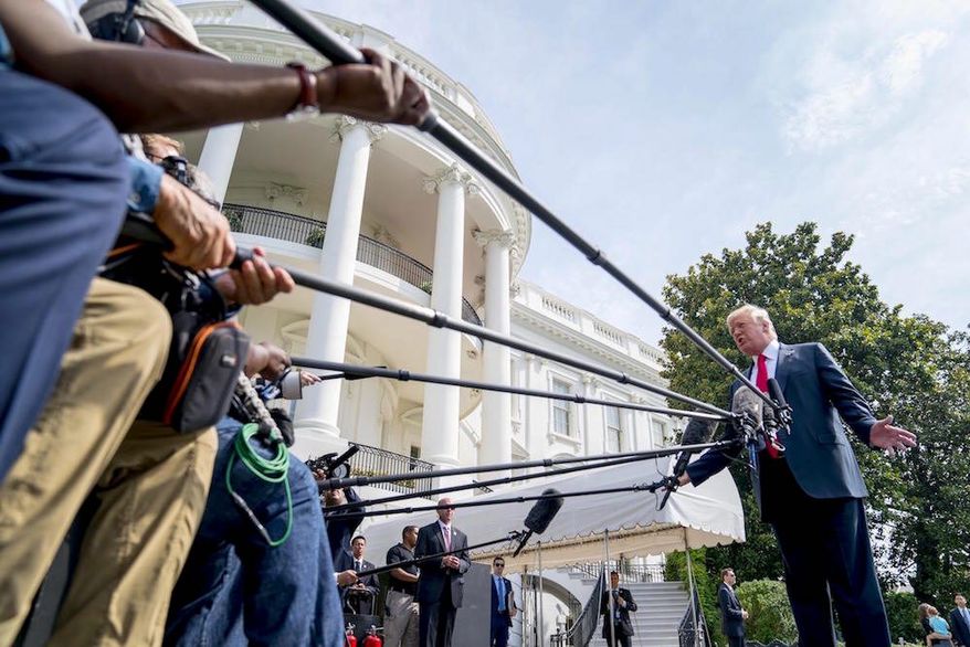 The negative media narrative this week against President Trump appears to be "tumbling" poll numbers, as multiple headlines reflect. (Associated Press)