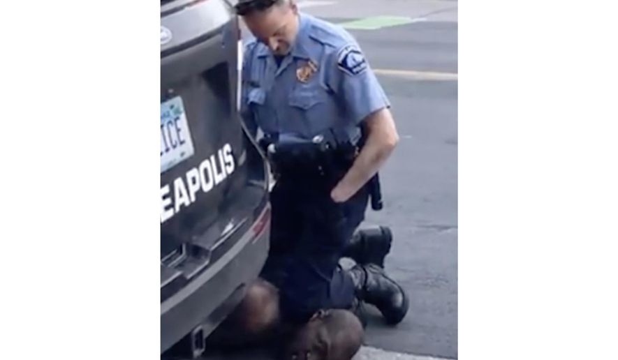 FILE - In this file frame from May 25, 2020, video provided by Darnella Frazier, a Minneapolis officer kneels on the neck of George Floyd, a handcuffed man who was pleading that he could not breathe. In the two weeks since Floyd’s killing, police departments have banned chokeholds, Confederate monuments have fallen and officers have been arrested and charged. The moves come amid a massive, nationwide outcry against violence by police and racism. (Darnella Frazier via AP, File)