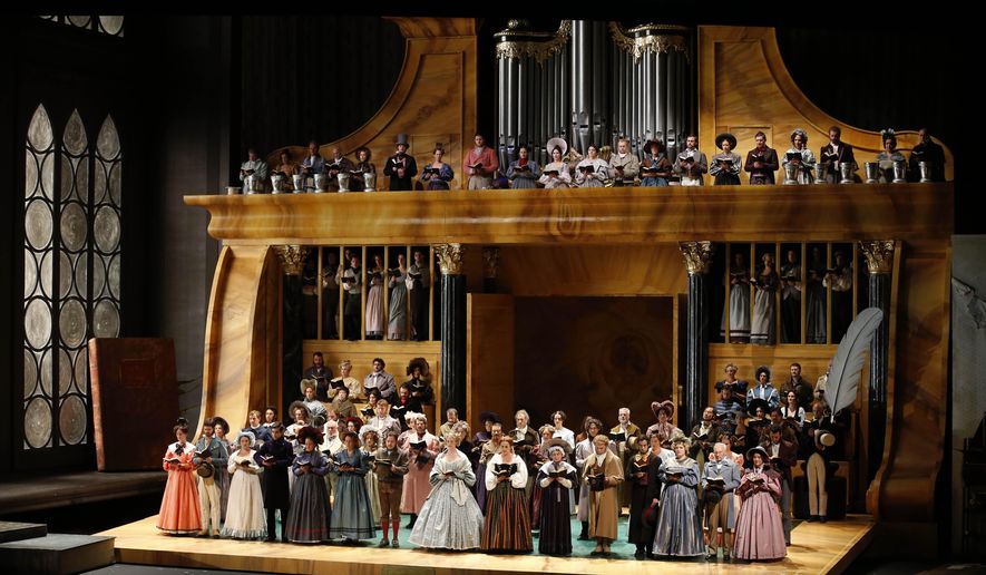 FILE - In this July 29, 2013, photo, a dress rehearsal for the opera "Die Meistersinger von Nuernberg," by Richard Wagner, takes place at the Salzburg Festival in Salzburg, Austria. The Salzburg Festival will be one of classical music’s few offerings in the summer of the coronavirus pandemic, staging a reduced 100th anniversary celebration with capacities limited to about 50%. (AP Photo/Matthias Schrader, File)