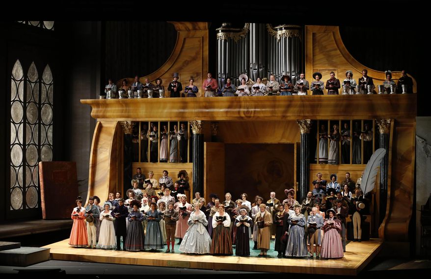 FILE - In this July 29, 2013, photo, a dress rehearsal for the opera "Die Meistersinger von Nuernberg," by Richard Wagner, takes place at the Salzburg Festival in Salzburg, Austria. The Salzburg Festival will be one of classical music’s few offerings in the summer of the coronavirus pandemic, staging a reduced 100th anniversary celebration with capacities limited to about 50%. (AP Photo/Matthias Schrader, File)