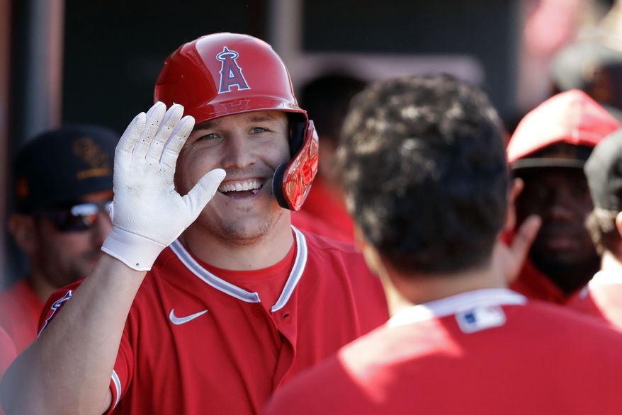 FILE - This Feb. 25, 2020, file photo shows Los Angeles Angels' Mike Trout after scoring during the first inning of a spring training baseball game against the Cincinnati Reds, in Tempe, Ariz. Trout was nominated to the New Jersey Hall of Fame on June 9, 2020. (AP Photo/Darron Cummings, File)