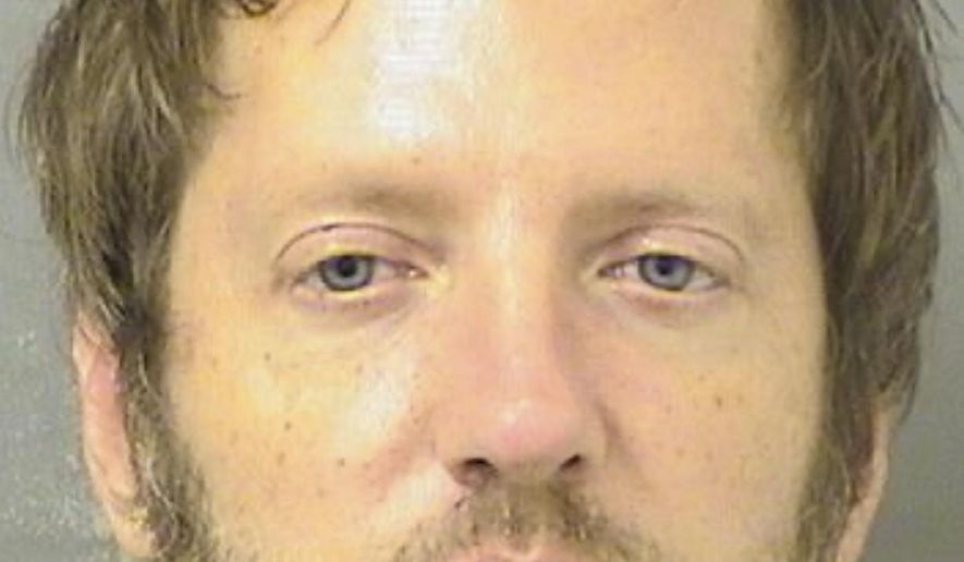 This booking image provided by the Palm Beach County Sheriff's Office shows Shaun Michaelsen, 41, who is facing felony charges after police said he let a 12-year-old girl drive his SUV and told her to speed because he wanted to be a “cool father” — even though he is not her dad. (Palm Beach County Sheriff's Office via AP)