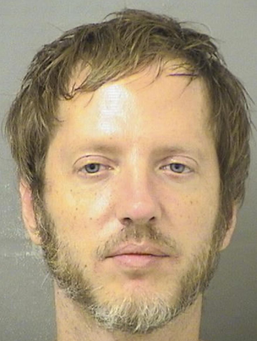This booking image provided by the Palm Beach County Sheriff's Office shows Shaun Michaelsen, 41, who is facing felony charges after police said he let a 12-year-old girl drive his SUV and told her to speed because he wanted to be a “cool father” — even though he is not her dad. (Palm Beach County Sheriff's Office via AP)