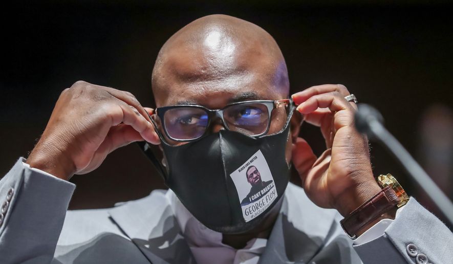 Philonise Floyd, a brother of George Floyd, arrives to testify before a House Judiciary Committee hearing on proposed changes to police practices and accountability on Capitol Hill, Wednesday, June 10, 2020, in Washington. (Michael Reynolds/Pool via AP)