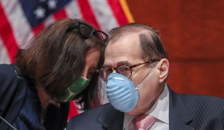 Chairman of the House Judiciary Committee, Rep. Jerry Nadler, D-N.Y., speaks with an aide before a House Judiciary Committee hearing on proposed changes to police practices and accountability on Capitol Hill, Wednesday, June 10, 2020, in Washington. (Michael Reynolds/Pool via AP)