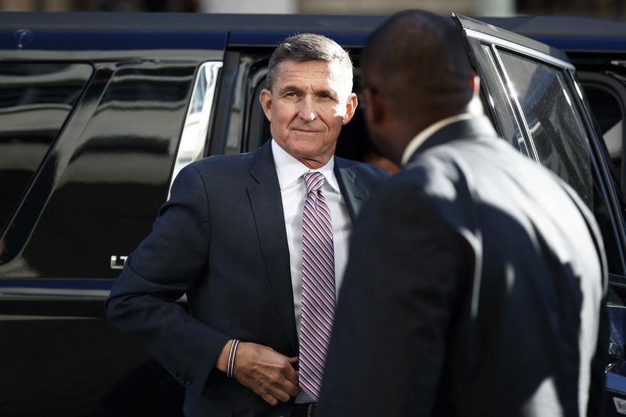 In this Dec. 18, 2018, photo, President Donald Trump&#39;s former National Security Adviser Michael Flynn arrives at federal court in Washington. (AP Photo/Carolyn Kaster) ** FILE **