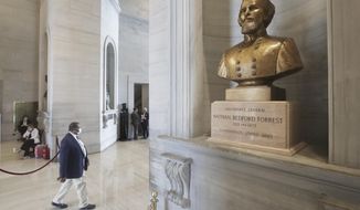 A bust of Nathan Bedford Forrest is displayed in the Tennessee State Capitol Tuesday, June 9, 2020, in Nashville, Tenn. Tennessee lawmakers remain torn on whether to support a proposal for the removal of a contentious bust of the former Confederate general and early leader of the Ku Klux Klan. If approved by the GOP-controlled Legislature, the measure encourages the bust of Forrest be removed from the Tennessee Capitol and instead be replaced with an &amp;quot;appropriate tribute to a deserving Tennessean.&amp;quot; (AP Photo/Mark Humphrey)