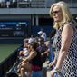 FILE - In this Aug. 24, 2017, file photo, Stacey Allaster, the U.S. Tennis Association&#39;s chief executive of professional tennis, watches a qualifying round of the U.S Open, as she was posing for a photo in New York. Allaster is taking over as the U.S. Open’s tournament director, the first woman to hold that job at the American Grand Slam tennis tournament. She will stay on as the USTA&#39;s chief executive of professional tennis, the association said Wednesday, June 10, 2020. (AP Photo/Michael Noble Jr., File)