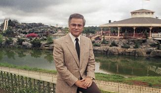 FILE - In this March 19, 1987, file photo, Television evangelist Jim Bakker poses in Columbia, S.C. Missouri-based TV pastor Jim Bakker, in a court filing on Monday, May 4, 2020, is asking a judge to dismiss a state lawsuit accusing him of falsely claiming that a health supplement could cure the coronavirus. The lawsuit said Bakker and a guest made the cure claim during a program on Feb. 12. (AP Photo/Lou Krasky File)