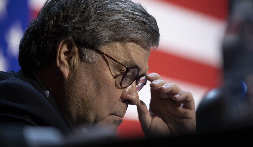 Attorney General William Barr is seated before President Donald Trump speaks during a roundtable discussion about &quot;Transition to Greatness: Restoring, Rebuilding, and Renewing&quot; at Gateway Church Dallas, Thursday, June 11, 2020, in Dallas. (AP Photo/Alex Brandon) **FILE**