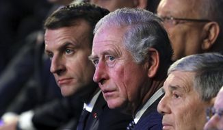 FILE- In this Thursday, Jan 23, 2020 file photo, from left, French President Emmanuel Macron and Britain&#x27;s Prince Charles attend the World Holocaust Forum at the Yad Vashem Holocaust memorial museum in Jerusalem.  Britain’s Prince Charles will host French President Emmanuel Macron for a special celebration marking the 80th anniversary of Gen. Charles De Gaulle’s defiant appeal to the French people to resist the Nazis during World War II. Charles and his wife, the Duchess of Cornwall, will receive Macron at his Clarence House home with a Guard of Honor formed  by Number 7 Company of the Coldstream Guards and accompanied the Band of the Coldstream Guards on Thursday, June 18, 2020. (Abir Sultan/Pool Photo via AP, File)