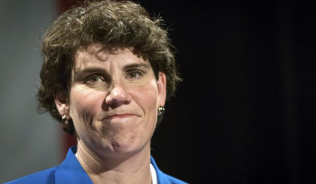 FILE - In this Nov. 6, 2018, file photo, Amy McGrath speaks to supporters in Richmond, Ky. McGrath, The Ex-Marine pilot who seemed to be gliding toward a primary victory in Kentucky, has come under heavy fire from both directions in the closing days of the Democratic contest to determine who challenges Republican Senate Majority Leader Mitch McConnell in the fall. (AP Photo/Bryan Woolston, File)