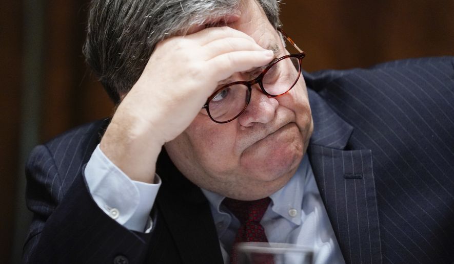Attorney General William Barr listens during a roundtable with President Donald Trump about America&#39;s seniors, in the Cabinet Room of the White House, Monday, June 15, 2020, in Washington. (AP Photo/Evan Vucci)