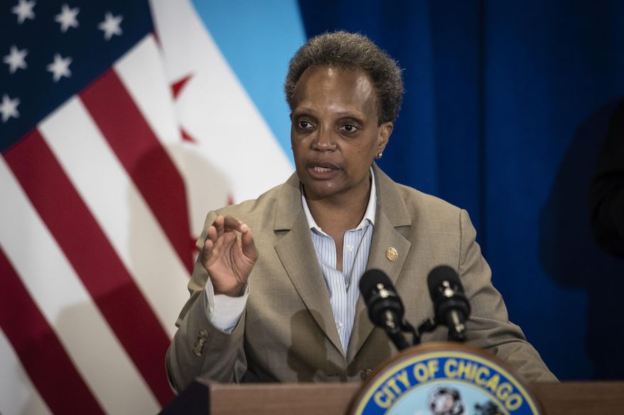 Mayor Lori Lightfoot speaks during a press conference at City Hall to announce the city&#x27;s new Use of Force Working Group, designed to to review the Chicago Police Department&#x27;s policies pertaining to use of force, Monday morning, June 15, 2020. (Ashlee Rezin Garcia/Chicago Sun-Times via AP) ** FILE **