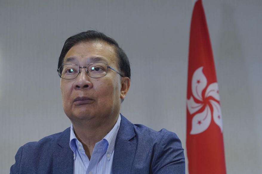 Tam Yiu Chung, Hong Kong's representative to the Standing Committee of the National People's Congress speak during an interview in Hong Kong, Monday, June 15, 2020. Tam said Monday that many Hong Kong residents support a new national security law being imposed by Beijing in the hopes that it will help the city regain stability, despite concerns that it will be used to curb opposition in the semi-autonomous Chinese territory. (AP Photo/Vincent Yu)