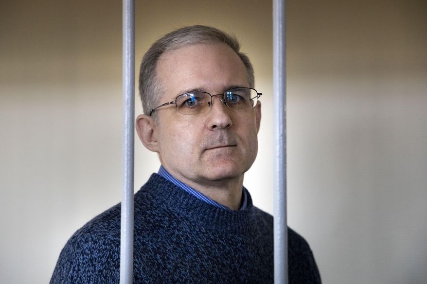 In this Aug. 23, 2019, file photo, Paul Whelan, a former U.S. marine who was arrested for alleged spying in Moscow on Dec. 28, 2018, stands in a cage as he waits for a hearing in a court room in Moscow, Russia. (AP Photo/Alexander Zemlianichenko. File)