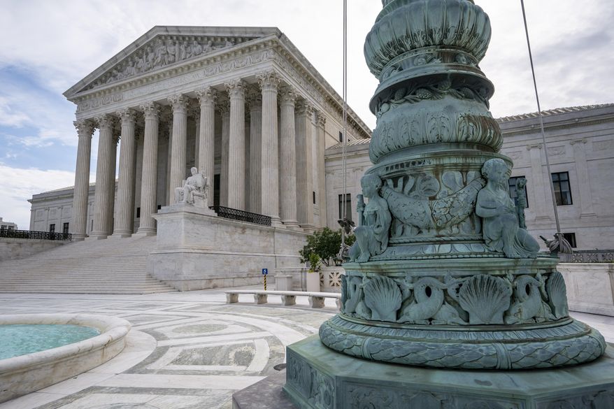 The Supreme Court is seen in Washington, early Monday, June 15, 2020. (AP Photo/J. Scott Applewhite)
