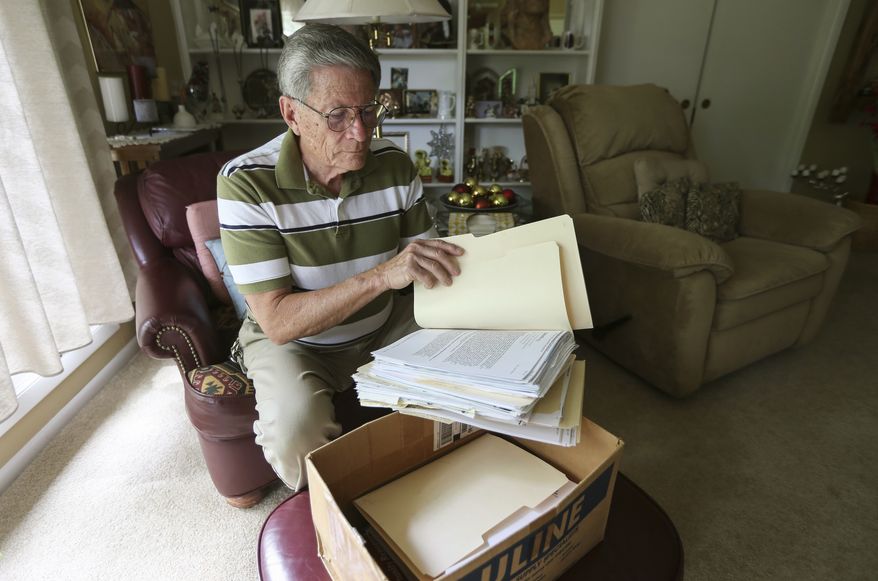 Fred Haines of Wichita, Kansas, was the victim of elaborate financial schemes a decade ago and is still paying on the debt he incurred. (Travis Heying /The Wichita Eagle via AP)