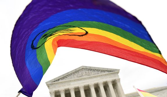 In this Oct. 8, 2019, file photo, people gather outside the Supreme Court in Washington. The Supreme Court’s Monday ruling shielding LGBT people from employment discrimination dealt a blow to religious conservatives — and was penned by a justice they lauded after his nomination by President Donald Trump. Longtime evangelical conservative leader James Dobson said Tuesday, June 16, 2020, in a statement that what he considers an “abhorrent decision” suggests the nation “is in the midst of a spiritual war over its very heart and soul.” (AP Photo/Susan Walsh, File)