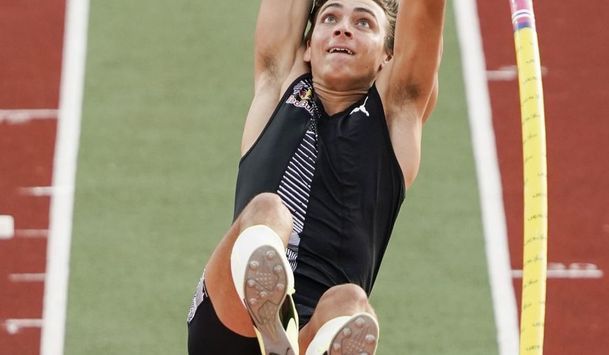 Armand Duplantis of Sweden competes in the pole vault event, during the Impossible Games 2020 in Bislett Stadium, Oslo, Thursday, June 11, 2020. (Cornelius Poppe/NTB scanpix via AP)
